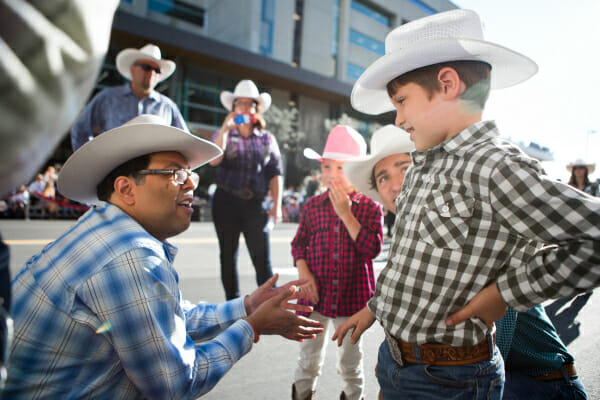 Justin Trudeau, Xavier, and Ella-Grace meet Mayor Nenshi at the 2014 Calgary Stampede. July 4, 2014.